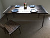 Tortured Reclaimed Distressed Industrial Wood Dining Table with hairpin legs