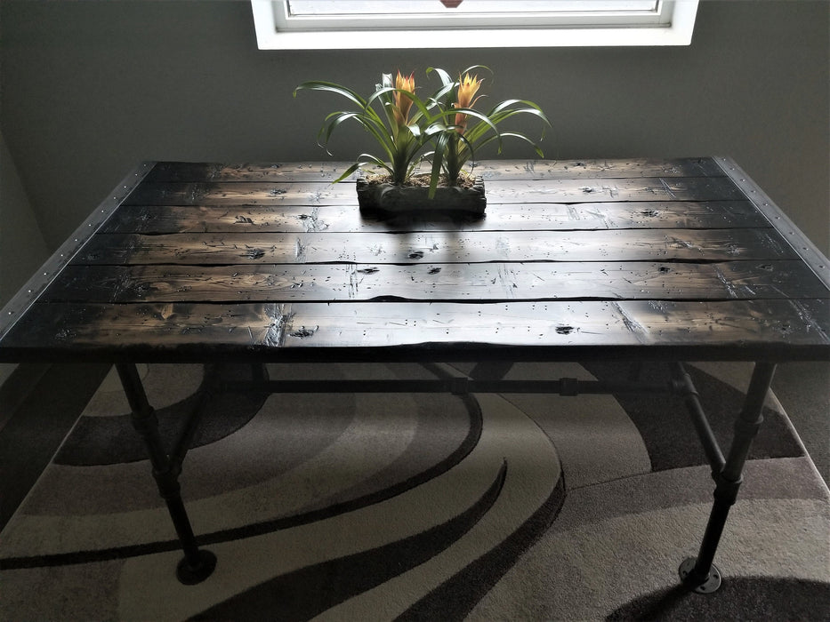 Tortured Reclaimed Distressed Industrial Dining Table with pipe legs