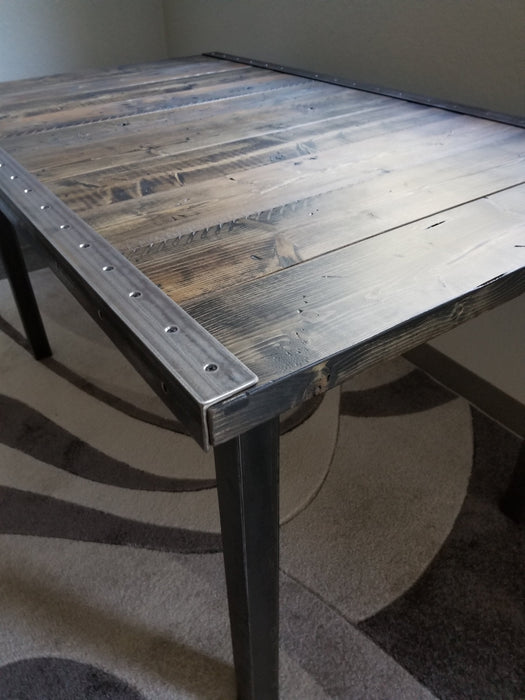 Reclaimed Distressed Custom built Industrial desk with raw steel trim and straight steel legs