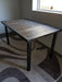 Reclaimed Distressed Custom built Industrial desk with raw steel trim and straight steel legs