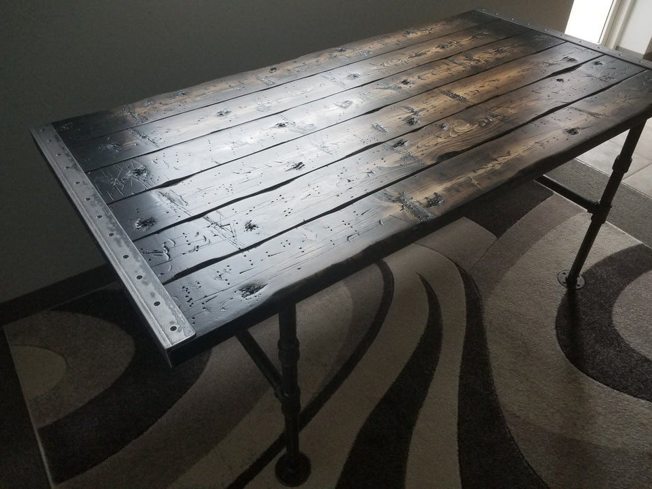 Tortured Reclaimed Distressed Industrial Dining Table with pipe legs